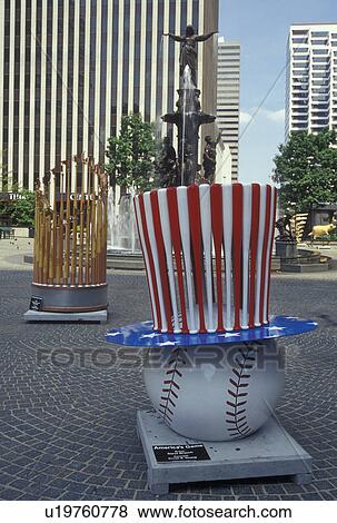 Stock Photo -  Cincinnati, OH, Ohio, Fountain Square, America's Game, Batsincredible sculptures, downtown. Fotosearch