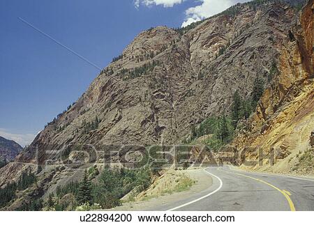 Stock Image -  Colorado, San Juan Mountains, CO, San Juan National Forest, Highway 550, Million Dollar Highway, road. Fotosearch