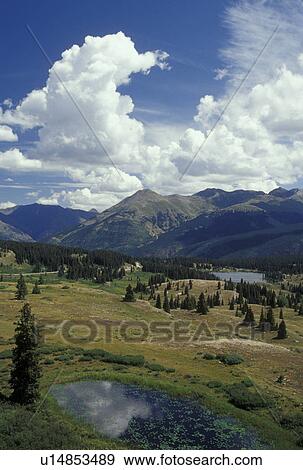 Colorado, San Juan Mountains, CO, San Juan National Forest, Scenic view of the San Juan Mountains from Molass Pass along the San Juan Skyway View Large Photo Image Stock Photo - Colorado, San Juan Mountains, CO, San Juan National Forest, Scenic view of the San Juan Mountains from Molass Pass along the San Juan Skyway. Fotosearch