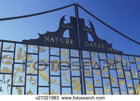 Custer, SD, South Dakota, Black Hills, Nature Gates, brass silhouette of birds and mammals View Large Photo Image Stock Image - Custer, SD, South Dakota, Black Hills, Nature Gates, brass silhouette of birds and mammals. Fotosearch