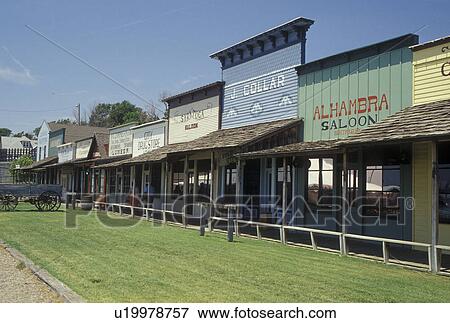 Stock Photo -  Dodge City, KS, Kansas, Boot Hill Museum, INC. on Front Street. Fotosearch