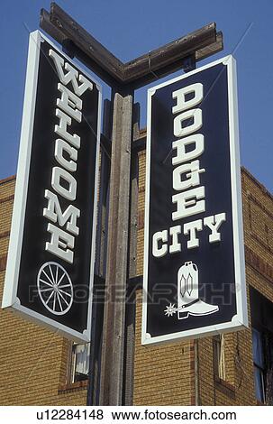 Dodge City, KS, Kansas, Front Street, welcome sign View Large Photo Image Stock Photo - Dodge City, KS, Kansas, Front Street, welcome sign. Fotosearch