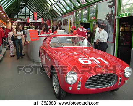 Stock Image -  Emilia-Romagna, Italy, Maranello, Europe, Ferrari race car displayed inside the Galleria Ferrari in the town of Maranello.. Fotosearch