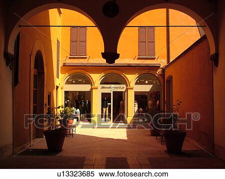 Stock Photography -  Emilia-Romagna, Italy, Reggio nell'Emilia, Europe, Shop in an arcade in the town of Reggio Emilia.. Fotosearch