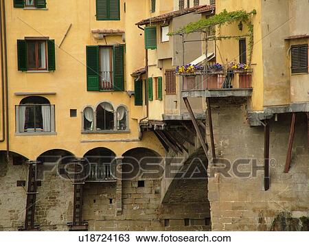 Florence, Italy, Tuscany, Firenza, Toscana, Europe, Ponte Vecchio, a bridge lined with shops, crosses the River Arno in the city of Florence. View Large Photo Image Stock Image - Florence, Italy, Tuscany, Firenza, Toscana, Europe, Ponte Vecchio, a bridge lined with shops, crosses the River Arno in the city of Florence.. Fotosearch
