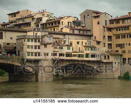 Florence, Italy, Tuscany, Firenza, Toscana, Europe, Ponte Vecchio, a bridge lined with shops, crosses the River Arno in the city of Florence. View Large Photo Image Stock Photography - Florence, Italy, Tuscany, Firenza, Toscana, Europe, Ponte Vecchio, a bridge lined with shops, crosses the River Arno in the city of Florence.. Fotosearch