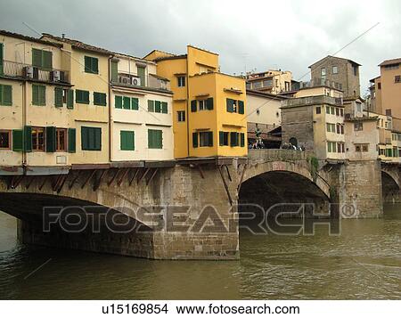 Florence, Tuscany, Italy, Firenza, Toscana, Europe, Ponte Vecchio, a bridge lined with shops, crosses the River Arno in the city of Florence. View Large Photo Image Picture - Florence, Tuscany, Italy, Firenza, Toscana, Europe, Ponte Vecchio, a bridge lined with shops, crosses the River Arno in the city of Florence.. Fotosearch