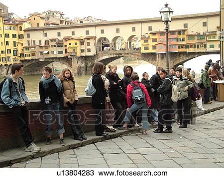 Florence, Tuscany, Italy, Firenza, Toscana, Europe, Ponte Vecchio, a bridge lined with shops, crosses the River Arno in the city of Florence. View Large Photo Image Stock Image - Florence, Tuscany, Italy, Firenza, Toscana, Europe, Ponte Vecchio, a bridge lined with shops, crosses the River Arno in the city of Florence.. Fotosearch