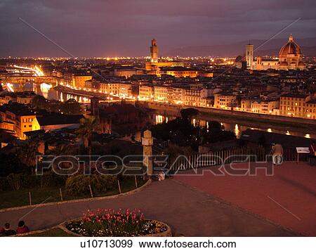 Stock Photo -  Florence, Tuscany, Italy, Firenza, Toscana, Europe, Scenic view of the city of Florence in the evening.. Fotosearch