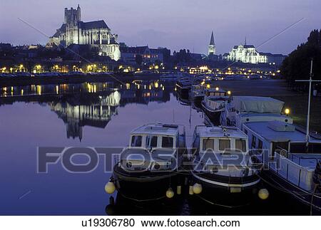 France, Auxerre, Burgundy, Yonne, Bourgogne, Europe, wine region, View of the Cathedral St. Etienne and house barges along the Yonne River in the evening in the city of Auxerre. View Large Photo Image Stock Image - France, Auxerre, Burgundy, Yonne, Bourgogne, Europe, wine region, View of the Cathedral St. Etienne and house barges along the Yonne River in the evening in the city of Auxerre.. Fotosearch