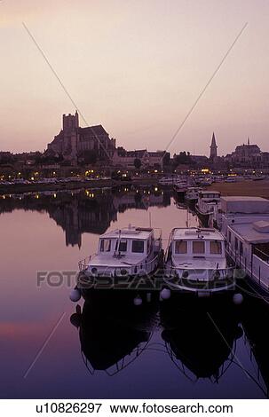 France, Auxerre, Burgundy, Yonne, Bourgogne, Europe, wine region, View of the Cathedral St. Etienne and house barges along the Yonne River in the evening in the city of Auxerre. View Large Photo Image Stock Photo - France, Auxerre, Burgundy, Yonne, Bourgogne, Europe, wine region, View of the Cathedral St. Etienne and house barges along the Yonne River in the evening in the city of Auxerre.. Fotosearch