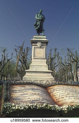Stock Image -  France, Burgundy, Macon, Saone-et-Loire, Bourgogne, Europe, wine region, Monument in the Quai Lamartine district in the city of Macon.. Fotosearch
