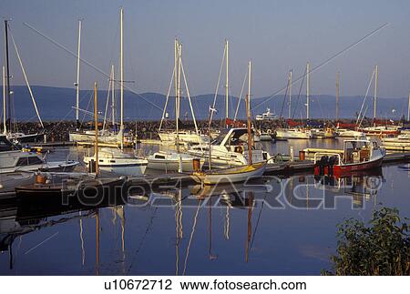 Stock Image -  Gaspe Peninsula, Gaspe, Quebec, Canada, Gulf of St. Lawrence, Boats docked in a marina along the Gulf of St. Lawrence in Gaspe on the Gaspe Peninsula.. Fotosearch