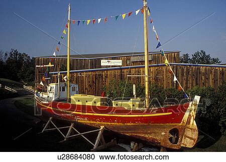 Gaspe Peninsula, Gaspe, Quebec, Canada, Gulf of St. Lawrence, Red sailing vessel displayed at the Gaspesie Museum (Musee de la Gaspesie) in Gaspe on the Gaspe Peninsula. View Large Photo Image Stock Image - Gaspe Peninsula, Gaspe, Quebec, Canada, Gulf of St. Lawrence, Red sailing vessel displayed at the Gaspesie Museum (Musee de la Gaspesie) in Gaspe on the Gaspe Peninsula.. Fotosearch