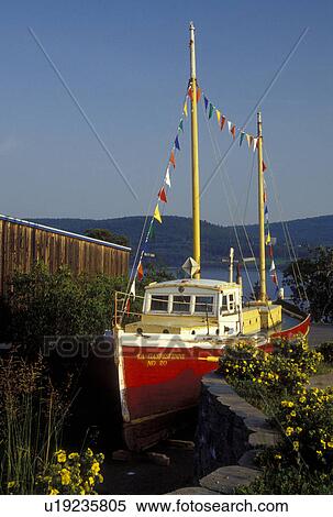 Gaspe Peninsula, Gaspe, Quebec, Canada, Gulf of St. Lawrence, Red sailing vessel displayed at the Gaspesie Museum (Musee de la Gaspesie) in Gaspe on the Gaspe Peninsula. View Large Photo Image Stock Photography - Gaspe Peninsula, Gaspe, Quebec, Canada, Gulf of St. Lawrence, Red sailing vessel displayed at the Gaspesie Museum (Musee de la Gaspesie) in Gaspe on the Gaspe Peninsula.. Fotosearch
