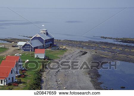 Gaspe Peninsula, Petit Vallee, Quebec, Canada, Gulf of St. Lawrence, Scenic view of white cabins with red roofs in the village of Petit Vallee on the Gaspe Peninsula along the St. Lawrence River in Quebec. View Large Photo Image Stock Photo - Gaspe Peninsula, Petit Vallee, Quebec, Canada, Gulf of St. Lawrence, Scenic view of white cabins with red roofs in the village of Petit Vallee on the Gaspe Peninsula along the St. Lawrence River in Quebec.. Fotosearch