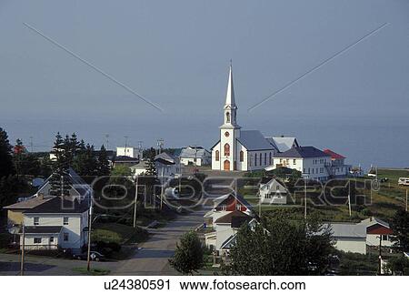 Stock Image -  Gaspe Peninsula, St-Maurice-de-L'Echouerie, Quebec, Canada, Gulf of St. Lawrence, Scenic view of the village of St-Maurice-de-L'Echouerie on the Gaspe Peninsula along the St. Lawrence River in Quebec.. Fotosearch