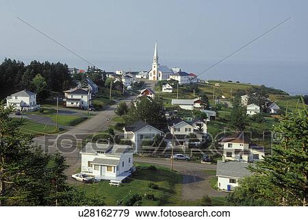 Stock Photo -  Gaspe Peninsula, St-Maurice-de-L'Echouerie, Quebec, Canada, Gulf of St. Lawrence, Scenic view of the village of St-Maurice-de-L'Echouerie on the Gaspe Peninsula along the St. Lawrence River in Quebec.. Fotosearch
