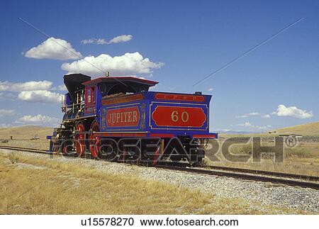 Stock Image -  Golden Spike National Historic Site, UT, Utah, Jupiter Train, Promontory Summit, the place where the Union Pacific and Central Pacific rails met to form the nation's first transcontinental railroad. Fotosearch
