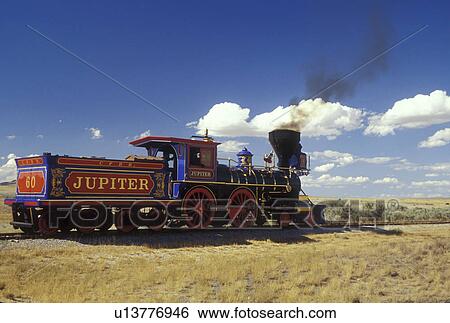 Stock Photograph -  Golden Spike National Historic Site, UT, Utah, Jupiter Train, Promontory Summit, the place where the Union Pacific and Central Pacific rails met to form the nation's first transcontinental railroad. Fotosearch