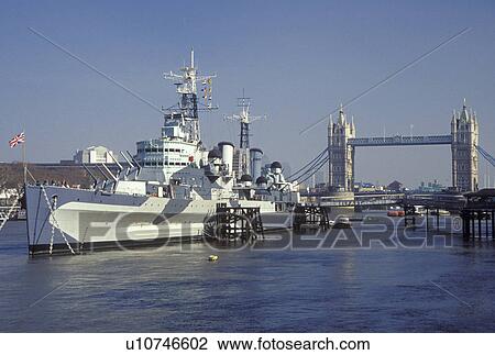 HMS Belfast, London, England, Great Britain, United Kingdom, Europe, H. M. S. Belfast Naval Battleship and Tower Bridge crossing the River Thames. View Large Photo Image Stock Image - HMS Belfast, London, England, Great Britain, United Kingdom, Europe, H. M. S. Belfast Naval Battleship and Tower Bridge crossing the River Thames.. Fotosearch