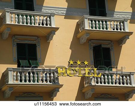 hotel, Liguria, Italy, Rapallo, Riviera di Levante, Ligurian Riviera, Europe, Balconies on the side of a three star hotel in the resort town of Rapallo along the Ligurian Sea. View Large Photo Image Stock Image - hotel, Liguria, Italy, Rapallo, Riviera di Levante, Ligurian Riviera, Europe, Balconies on the side of a three star hotel in the resort town of Rapallo along the Ligurian Sea.. Fotosearch