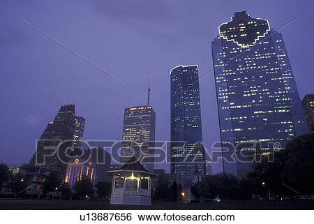 Stock Photograph -  Houston, TX, Texas, downtown, Sam Houston Park, evening. Fotosearch