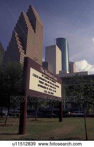 Stock Photo -  Houston, TX, Texas, downtown skyline, Wortham Center sign. Fotosearch