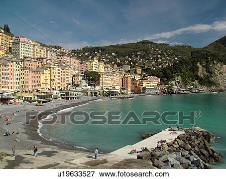Stock Photo -  Italy, Camogli, Liguria, Riviera di Levante, Ligurian Riviera, Europe, The beach along the waterfront of the resort town of Camogli along the Ligurian Sea.. Fotosearch