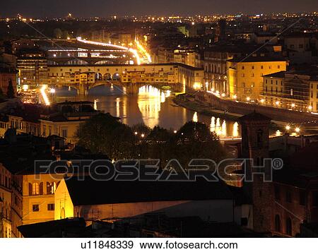 Stock Photo -  Italy, Florence, Tuscany, Firenza, Toscana, Europe, Scenic view of the city of Florence in the evening.. Fotosearch