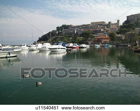 Italy, Lazio, Capodimonte, Europe, Boats docked in a marina on Lago di Bolsena in the village of Capodimonte. View Large Photo Image Stock Image - Italy, Lazio, Capodimonte, Europe, Boats docked in a marina on Lago di Bolsena in the village of Capodimonte.. Fotosearch