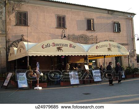 Italy, Lazio, Tarquinia, Europe, Outdoor restaurant in the medieval centre of Tarquinia. View Large Photo Image Stock Photography - Italy, Lazio, Tarquinia, Europe, Outdoor restaurant in the medieval centre of Tarquinia.. Fotosearch