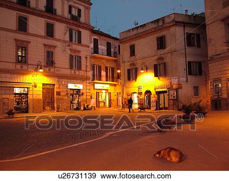 Stock Photo -  Italy, Lazio, Tarquinia, Europe, The medieval centre of Tarquinia in the evening.. Fotosearch