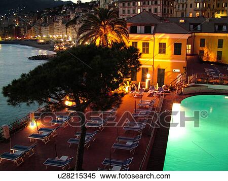 Italy, Liguria, Camogli, Riviera di Levante, Ligurian Riviera, Europe, Scenic view of the waterfront of the resort town of Camogli in the evening from the terrace of a resort hotel along the Ligurian Sea. View Large Photo Image Stock Photography - Italy, Liguria, Camogli, Riviera di Levante, Ligurian Riviera, Europe, Scenic view of the waterfront of the resort town of Camogli in the evening from the terrace of a resort hotel along the Ligurian Sea.. Fotosearch