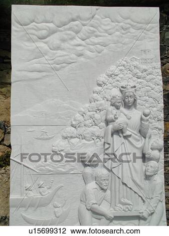 Stock Image -  Italy, Liguria, Chiavari, Riviera di Levante, Ligurian Riviera, Europe, Madonna di Grazie relief made of marble from in the resort town of Chiavari.. Fotosearch