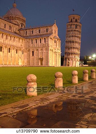 Stock Image -  Italy, Pisa, Tuscany, Toscana, Europe, The Cathedral and Leaning Tower (Torre Pendente) in Campo dei Miracoli (Field of Miracles) in the evening in the city of Pisa.. Fotosearch