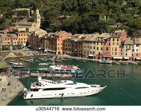 Stock Photograph -  Italy, Portofino, Liguria, Riviera di Levante, Ligurian Riviera, Europe, Scenic view of the village of Portofino along the Ligurian Coast.. Fotosearch