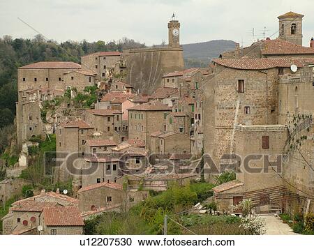 Stock Image -  Italy, Toscana, Tuscany, Sorano, Europe, View of the medieval walled city of Sorano in Tuscany.. Fotosearch