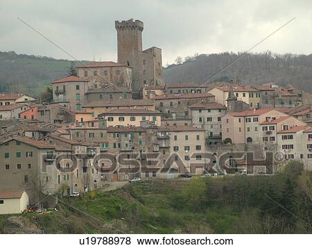 Stock Photo -  Italy, Tuscany, Arcidosso, Toscana, Europe, Scenic view of the medieval village of Arcidosso in Tuscany.. Fotosearch