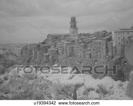 Stock Image -  Italy, Tuscany, Pitigliano, Toscana, Europe, View of the medieval walled village of Pitigliano.. Fotosearch