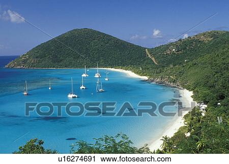 Jost Van Dyke, British Virgin Islands, Caribbean, BVI, Scenic view of the beach and boats anchored in White Bay on Jost Van Dyke Island on the Caribbean Sea. View Large Photo Image Stock Image - Jost Van Dyke, British Virgin Islands, Caribbean, BVI, Scenic view of the beach and boats anchored in White Bay on Jost Van Dyke Island on the Caribbean Sea.. Fotosearch