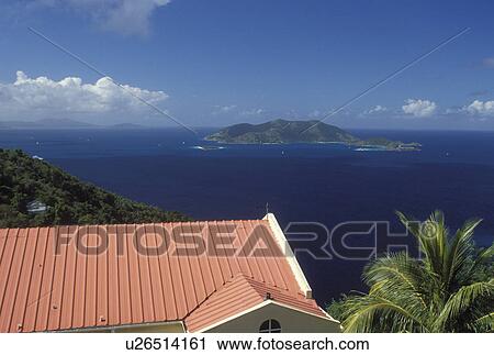Stock Image -  Jost Van Dyke, British Virgin Islands, Caribbean, BVI, View of Jost Van Dyke Island on the Caribbean Sea from Tortola.. Fotosearch