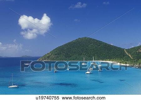 Stock Photography -  Jost Van Dyke, British Virgin Islands, Caribbean, BVI, View of boats anchored in White Bay on Jost Van Dyke Island on the Caribbean Sea.. Fotosearch