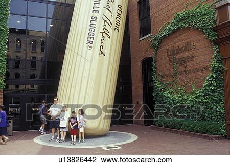 Stock Image -  KY, Louisville, Kentucky, Giant Baseball Bat displayed outside Louisville Slugger Museum, Hillerich & Bradsby Co.. Fotosearch
