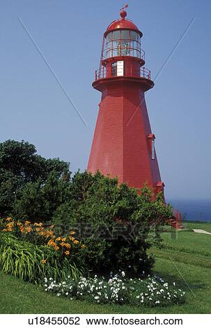 lighthouse, Gaspe Peninsula, Quebec, La Martre, Canada, Gulf of St. Lawrence, Red octagonal lighthouse museum in La Martre on the Gaspe Peninsula on the St. Lawrence River in Quebec. View Large Photo Image Stock Image - lighthouse, Gaspe Peninsula, Quebec, La Martre, Canada, Gulf of St. Lawrence, Red octagonal lighthouse museum in La Martre on the Gaspe Peninsula on the St. Lawrence River in Quebec.. Fotosearch