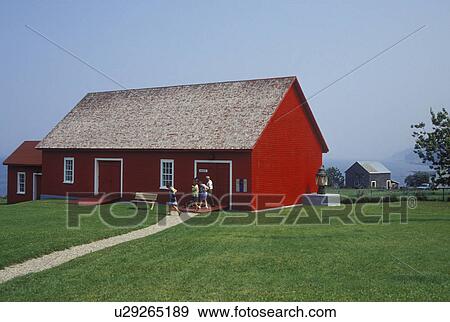 Stock Photo -  lighthouse, Gaspe Peninsula, Quebec, La Martre, Canada, Gulf of St. Lawrence, Red octagonal lighthouse museum in La Martre on the Gaspe Peninsula on the St. Lawrence River in Quebec.. Fotosearch
