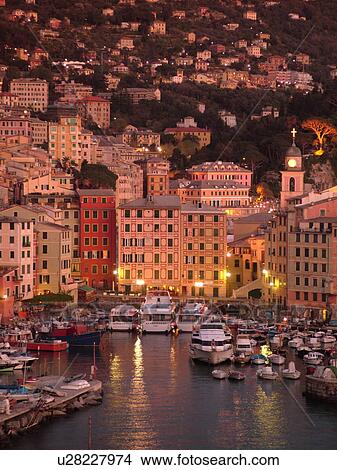 Liguria, Italy, Camogli, Riviera di Levante, Ligurian Riviera, Europe, Scenic view of the fishing port in the resort town of Camogli at sunset along the Ligurian Sea. View Large Photo Image Picture - Liguria, Italy, Camogli, Riviera di Levante, Ligurian Riviera, Europe, Scenic view of the fishing port in the resort town of Camogli at sunset along the Ligurian Sea.. Fotosearch