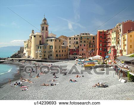Stock Image -  Liguria, Italy, Camogli, Riviera di Levante, Ligurian Riviera, Europe, The beach along the waterfront of the resort town of Camogli along the Ligurian Sea.. Fotosearch