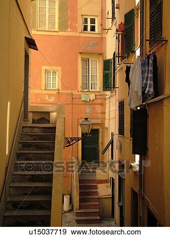 Liguria, Italy, Camogli, Riviera di Levante, Ligurian Riviera, Europe, Narrow alleyway with stairs in the resort town of Camogli. View Large Photo Image Stock Photo - Liguria, Italy, Camogli, Riviera di Levante, Ligurian Riviera, Europe, Narrow alleyway with stairs in the resort town of Camogli.. Fotosearch