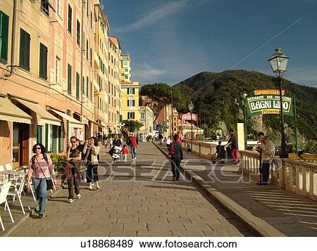 Stock Photo -  Liguria, Italy, Camogli, Riviera di Levante, Ligurian Riviera, Europe, Promenade along the waterfront of the resort town of Camogli along the Ligurian Sea.. Fotosearch